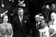 New Zealander Bruce McLaren, received the trophy from Prince Rainer III of Monaco and Princess Grace after winning the Grand Prix of Monaco auto race in Monte Carlo, Monaco on June 3, 1962. McLaren drove a British Cooper Climax over the finish line ahead of two Ferraris driven by Phil Hill of the United States (second) and Italy’s Lorenzo Bandini. (AP Photo)