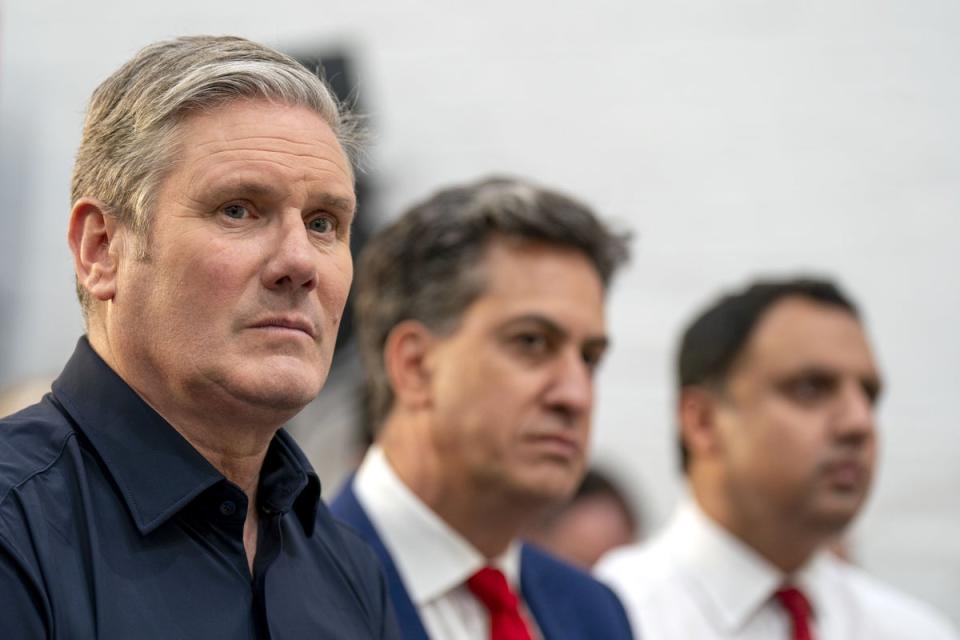 Labour leader Sir Keir Starmer, shadow climate change secretary Ed Miliband and Scottish Labour leader Anas Sarwar at the launch of the Labour party’s mission on cheaper green power (PA Wire)