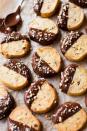 <p>Surprisingly, hazelnuts are a major industry in Oregon, and lucky for locals, the rich flavor is an amazing way to change up classic cookie recipes. These slice-and-bake Toasted Hazelnut Cookies<span class="redactor-invisible-space"> when dipped in rich chocolate, taste remarkably like Nutella.</span></p><p>Get the recipe from <a href="https://sallysbakingaddiction.com/2015/12/11/toasted-hazelnut-slice-n-bake-cookies-with-milk-chocolate/" rel="nofollow noopener" target="_blank" data-ylk="slk:Sally's Baking Addiction;elm:context_link;itc:0;sec:content-canvas" class="link ">Sally's Baking Addiction</a>.</p>