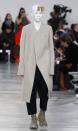 Asymmetric, sometimes deconstructed silhouettes came matched with all-white makeup at Rick Owens - fall/winter 2018-2019 collection. Paris, January 18, 2018