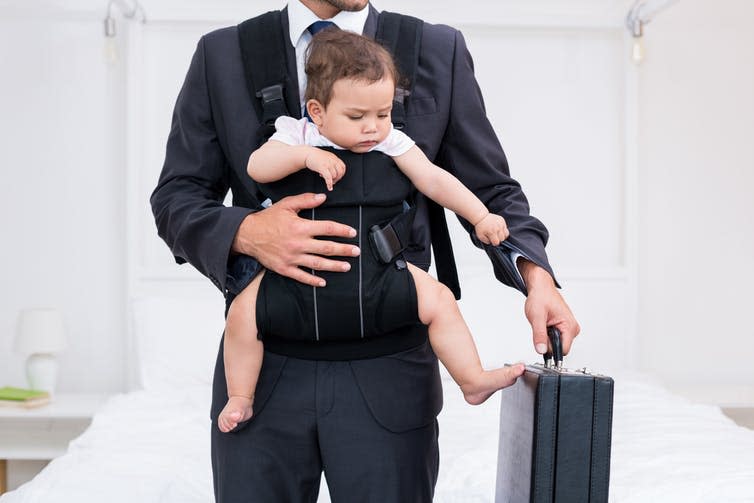 <span class="caption">Dads need better paternity leave.</span> <span class="attribution"><a class="link " href="https://www.shutterstock.com/image-photo/midsection-father-carrying-baby-while-holding-398289151" rel="nofollow noopener" target="_blank" data-ylk="slk:Shutterstock;elm:context_link;itc:0;sec:content-canvas">Shutterstock</a></span>