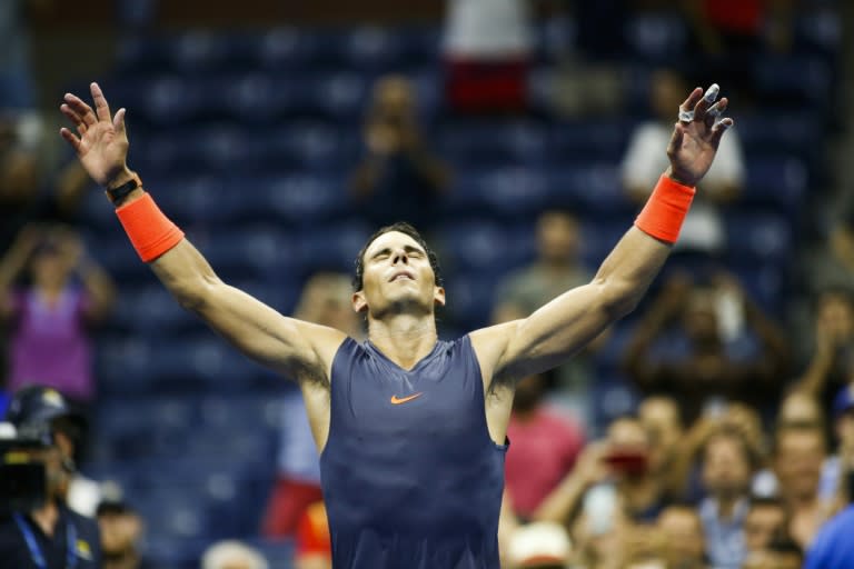 Victory roar: Rafael Nadal celebrates after defeating Dominic Thiem in their epic quarter-final