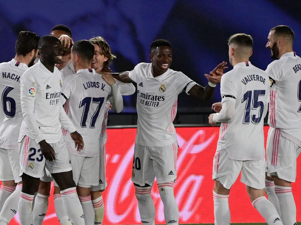 Real Madrid players celebrate during their derby win against Barca (AFP via Getty Images)