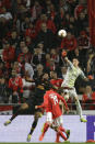 Benfica goalkeeper Odisseas Vlachodimos, right, clears the ball during the Europa League round of 32, second leg, soccer match between Benfica and Galatasaray at the Luz stadium in Lisbon, Thursday, Feb. 21, 2019. (AP Photo/Armando Franca)