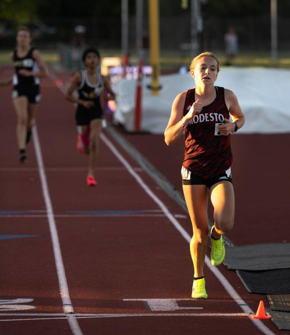 Modesto’s Maya Wolfe competes in the 3200 meter race at the CIF Sac-Joaquin Section Masters track finals at Davis High School in Davis, Calif., Saturday, May 20, 2023. Wolfe placed 21st at 11:55.08. Andy Alfaro/aalfaro@modbee.com