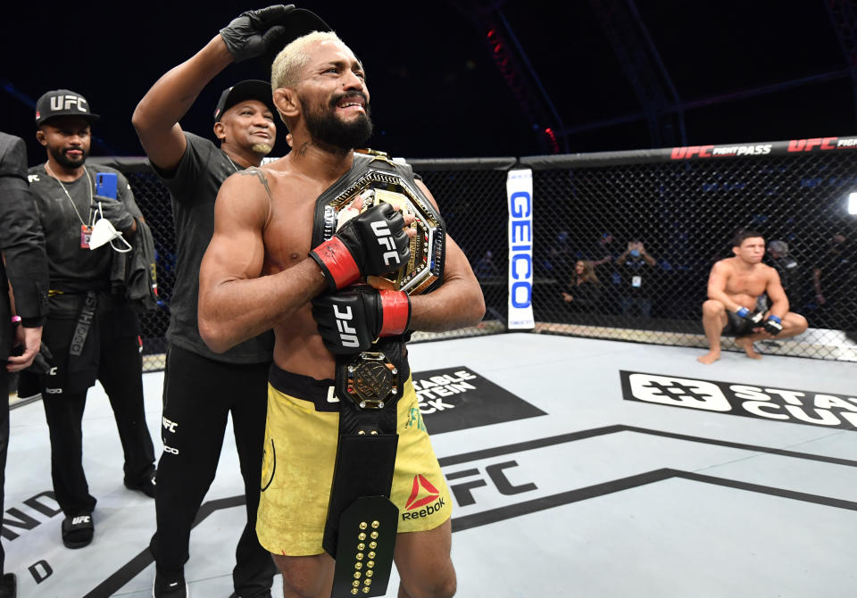 ABU DHABI, UNITED ARAB EMIRATES - JULY 19: Deiveson Figueiredo of Brazil celebrates after defeating Joseph Benavidez in their UFC flyweight championship bout during the UFC Fight Night event inside Flash Forum on UFC Fight Island on July 19, 2020 in Yas Island, Abu Dhabi, United Arab Emirates. (Photo by Jeff Bottari/Zuffa LLC via Getty Images)