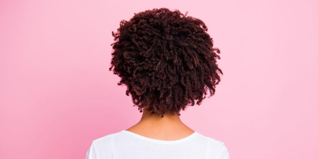 close up rear back behind view portrait of her she nice looking well groomed attractive wavy haired girl after salon procedure isolated over pink pastel background