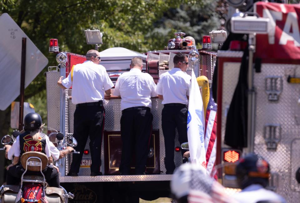 Pallbearers ride with the casket of Corey Comperatore from Cabot United Methodist Church in Winfield Township to the cemetery Friday, July 19th. Comparatore was killed at SaturdayÕs rally for former President Donald Trump from a would-be assigns stray bullet. Kevin Whitlock / Massillon Independent
Published Image