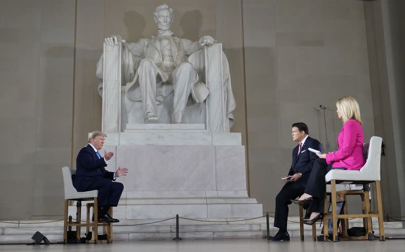 U.S. President Donald Trump participates in coronavirus disease (COVID-19) live town on hall on America returning to work held at Lincoln Memorial in Washington