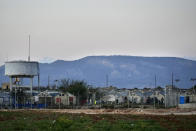 A view of the Pournara refugee camp is seen on the outskirts of divided capital Nicosia, Cyprus, Saturday, Jan. 28, 2023. Cypriots are voting Sunday for a new president who they’ll expect to decisively steer the small island nation through shifting geopolitical sands and uncertain economic times that have become people's overriding concern, eclipsing stalemated efforts to remedy the country’s ethnic division. (AP Photo/Petros Karadjias)