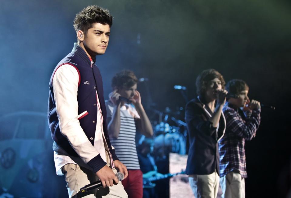 Zayn Malik as a member of One Direction in 2012. Redferns