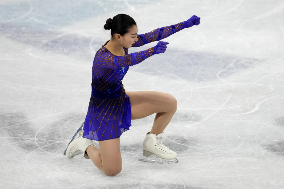 Kaori Sakamoto, of Japan, reacts after the women's free skate program during the figure skating competition at the 2022 Winter Olympics, Thursday, Feb. 17, 2022, in Beijing. (AP Photo/Natacha Pisarenko)