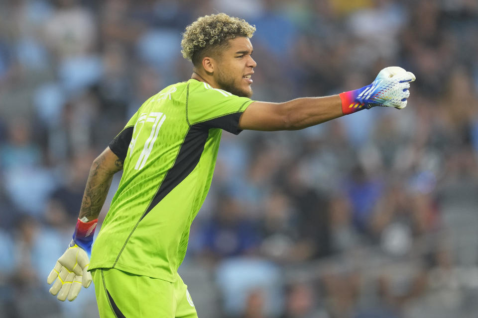 Minnesota United goalkeeper Dayne St. Clair directs teammates during the first half of an MLS soccer match against the Colorado Rapids, Wednesday, Aug. 30, 2023, in St. Paul, Minn. (AP Photo/Abbie Parr)