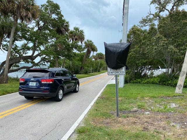 Covered 25 mph speed limit signs on Indian River Drive will be unveiled for Memorial Day weekend, which TCPalm columnist Blake Fontenay says will mark the end of fun driving along the scenic road.