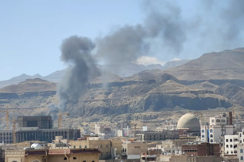 Smoke billows from the site of a Saudi-led air strike in Sanaa
