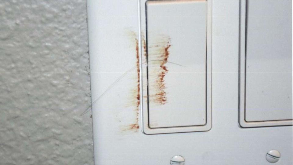 A Bexar County sheriff's deputy discovered what he believed was blood on the wall and possibly a hair. / Credit: Bexar County District Courts