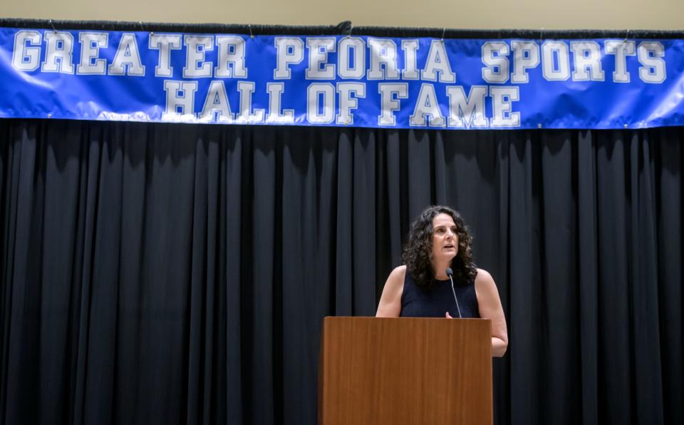 Illinois Central College volleyball coach Tracy Heffren accepts her Female Coach of the Year Award during an induction ceremony Saturday, March 23, 2024 for the Greater Peoria Sports Hall of Fame at the Peoria Civic Center.