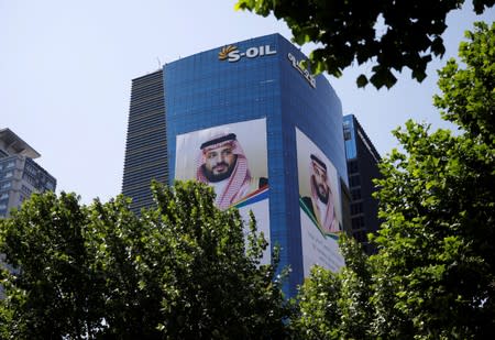 Giant banners welcoming Saudi Crown Prince Mohammed bin Salman hangs on the S-Oil headquarters building in Seoul