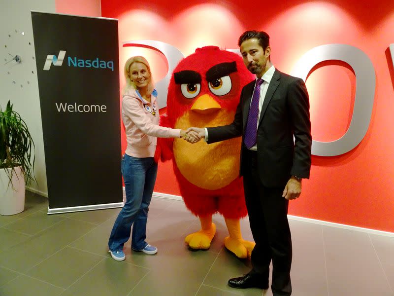 FILE PHOTO: Rovio CEO Levoranta and Nasdaq Helsinki President Husman shake hands in Espoo