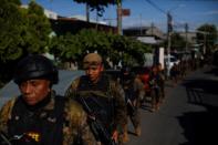 Government deploys 10,000 troops in violent gang-dominated capital suburb, in San Salvador