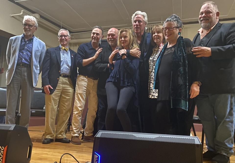 Participants in a tribute to Theatre by the Sea's Jon Kimbell gather after the Aug. 24 event in the St. John's Masonic Lodge auditorium in Portsmouth. From left, William Michael Maher, Wendell Purrington, Scott Weintraub, Kimbell, Ginny Russell, Jeff McCarthy, Marlena Schroeder, Ronda McNamara, and gala organizer Michael J. Tobin.