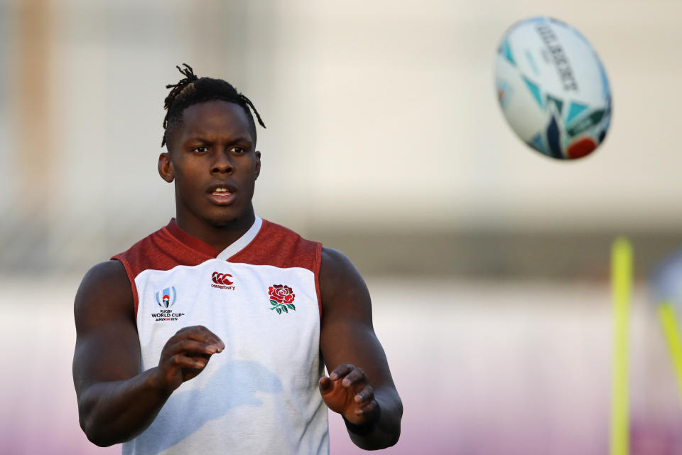 FILE - In this Wednesday, Oct. 23, 2019 file photo, England's Maro Itoje catches the ball during a training session in Urayasu, Japan. There are more questions than answers in a massive rugby scandal that on Saturday, Jan. 18, 2020 saw English and European champion Saracens get relegated for breaching salary-cap regulations. They own some of the most high-profile players in the sport, like England captain Owen Farrell and World Player of the Year nominees Maro Itoje and Billy Vunipola (AP Photo/Christophe Ena, file)