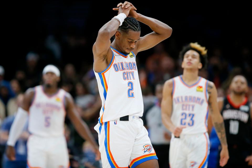 Thunder guard Shai Gilgeous-Alexander (2) walks back to the bench after a timeout during a 114-110 loss to the Rockets on Wednesday at Paycom Center.