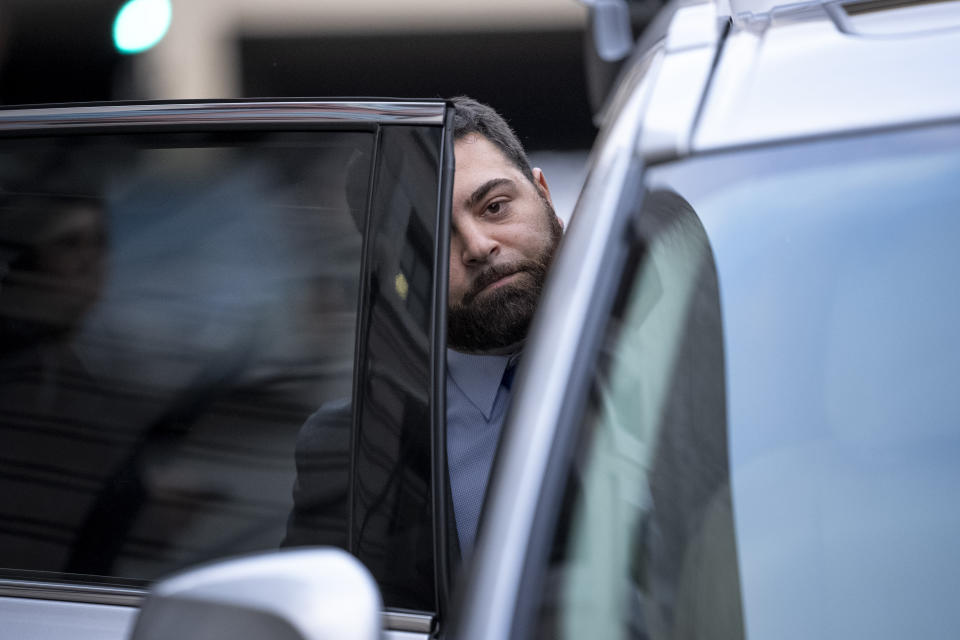 FILE - Roberto Minuta of Prosper, Texas, leaves federal court in Washington, Jan. 23, 2023. Minuta, a member of the far-right Oath Keepers extremist group who was part of a security detail for former President Donald Trump's longtime adviser Roger Stone before storming the U.S. Capitol, was sentenced on Thursday to more than four years in prison. (AP Photo/Andrew Harnik, File)