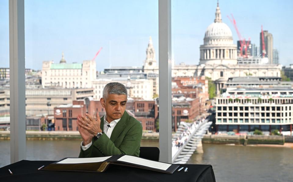 Sadiq Khan, the Mayor of London, is pictured today during his swearing in ceremony