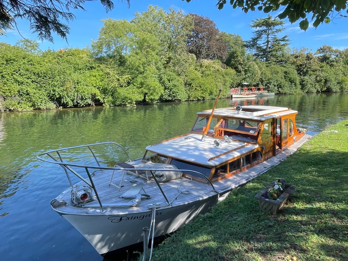 Fringella is a pretty, vintage wooden motor yacht offering dining and drinks (Fiona McIntosh)