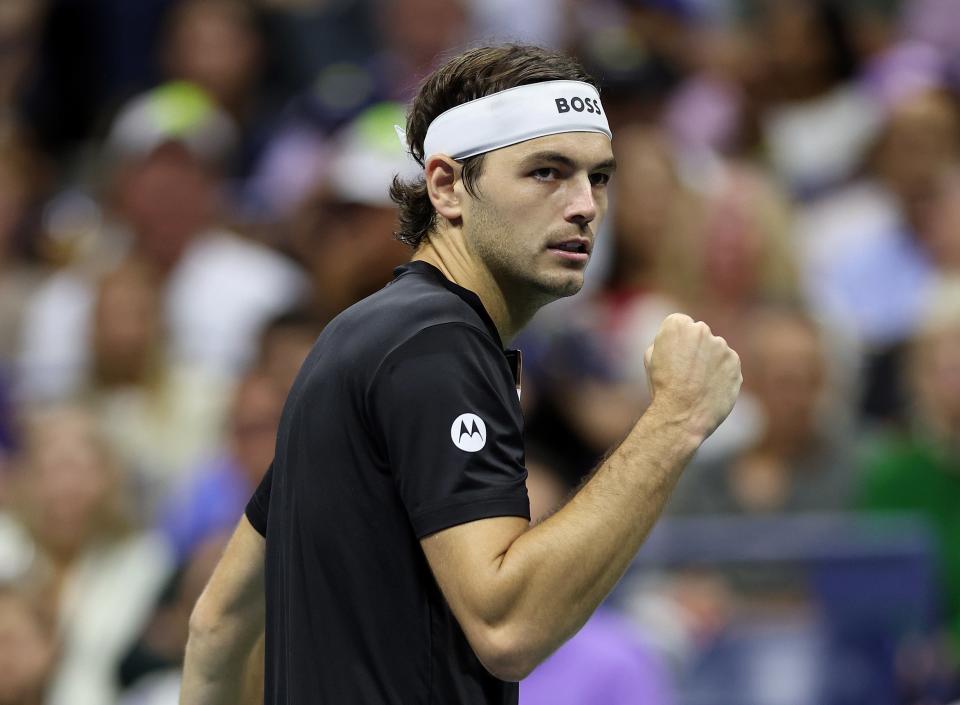 Taylor Fritz of the United States celebrates after winning the second set against Frances Tiafoe of the United States during their Men's Singles Semifinal match on Day Twelve of the 2024 US Open at USTA Billie Jean King National Tennis Center on September 06, 2024 in the Flushing neighborhood of the Queens borough of New York City. (Photo by Jamie Squire/Getty Images) (Getty Images)