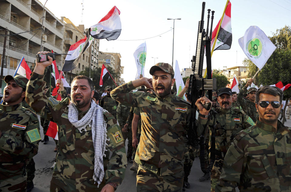 Iraqi Shiites from the Badr forces militia protest against the military intervention in Yemen, in Baghdad, Iraq in 2015. (Photo: Karim Kadim/AP) (Photo: ASSOCIATED PRESS)