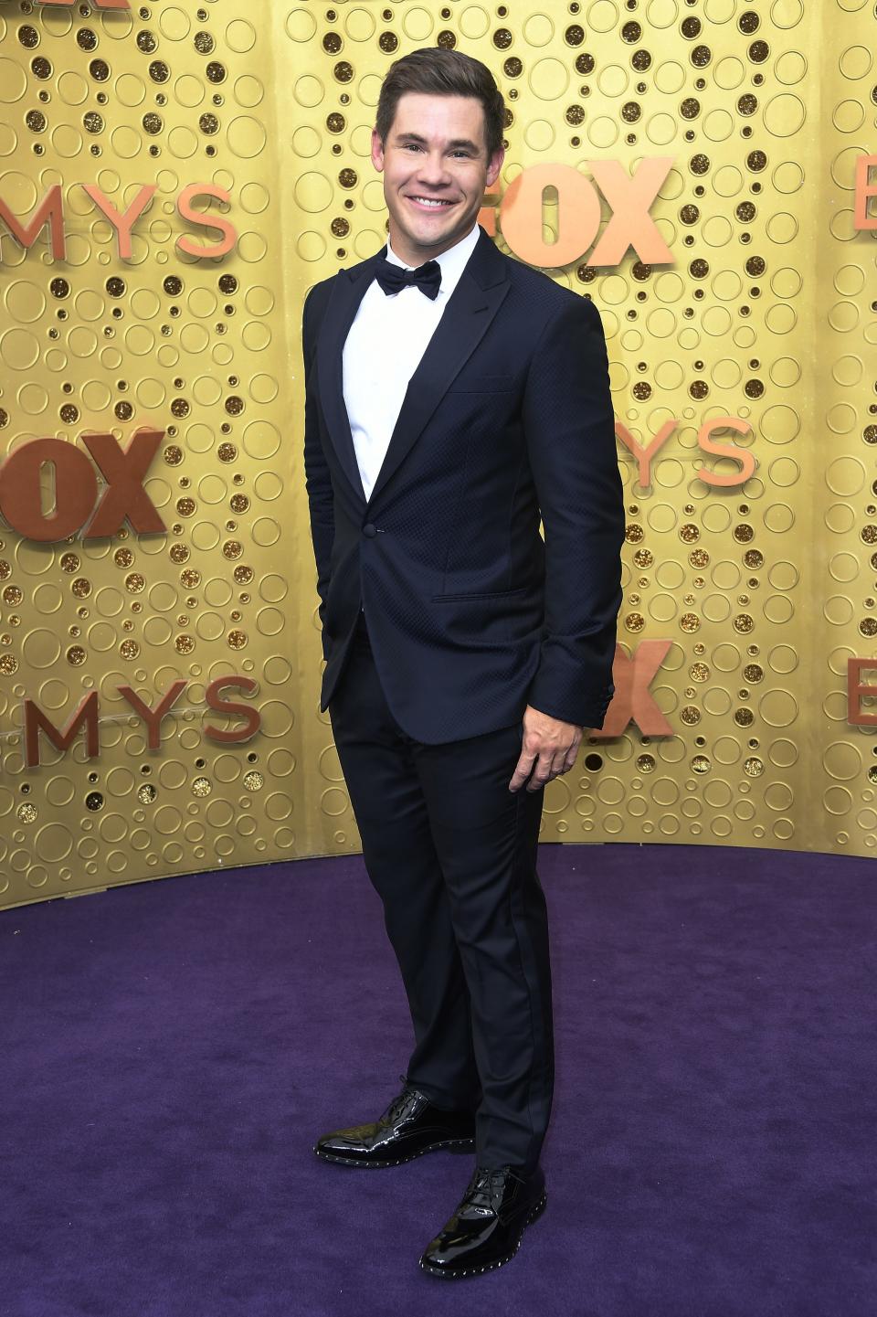 <h1 class="title">Adam DeVine in Jimmy Choo shoes and Montblanc jewelry</h1><cite class="credit">Photo: Getty Images</cite>