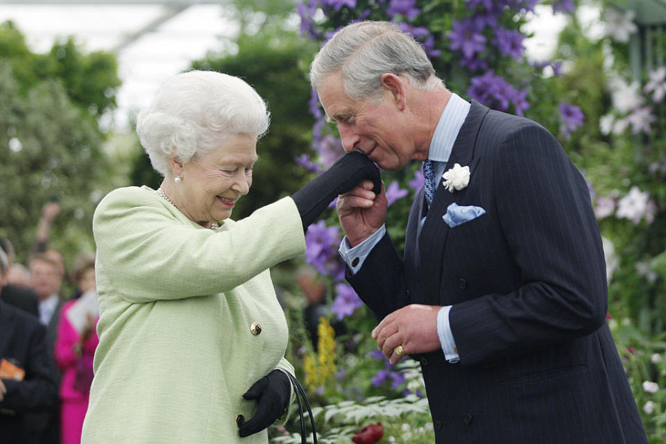 Elizabeth presents her son with the Royal Horticultural Society's Victoria Medal of Honour during a visit to the Chelsea Flower Show on May 18, 2009. (Getty Images)