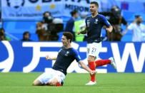 <p>France defender Benjamin Pavard celebrates his crashing equaliser after making it 2-2 </p>