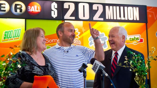 Brian and Mary Lohse celebrate their Powerball lottery victory — AP