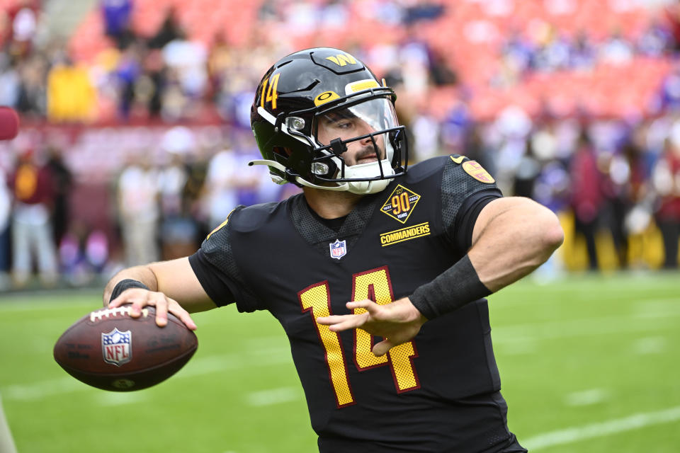 Washington Commanders quarterback Sam Howell (14) warms up against the <a class="link " href="https://sports.yahoo.com/nfl/teams/minnesota/" data-i13n="sec:content-canvas;subsec:anchor_text;elm:context_link" data-ylk="slk:Minnesota Vikings;sec:content-canvas;subsec:anchor_text;elm:context_link;itc:0">Minnesota Vikings</a> before the game at FedExField. Mandatory Credit: Brad Mills-USA TODAY Sports