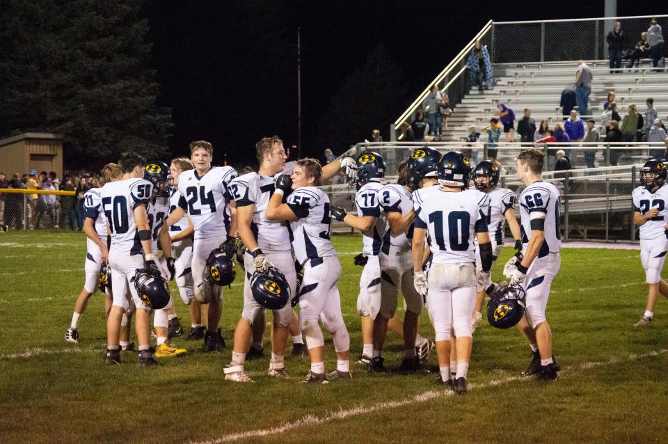 Hillsdale gathers at midfield to start their celebration of their week 5 win over Blissfield by a final score of 38-35.