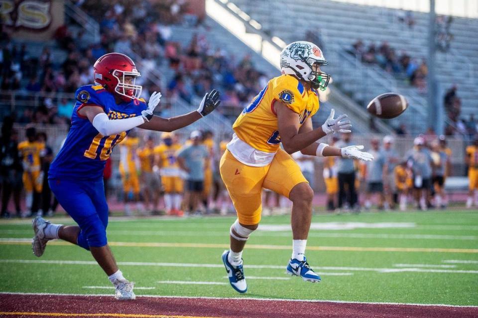 South All-Star Reyes Diaz (20) representing Le Grand, catches a touchdown pass during the Merced County All-Star Football Game at Golden Valley High School in Merced, Calif., on Saturday, June 15, 2024. The South All-Stars beat the North All-Stars 33-20.