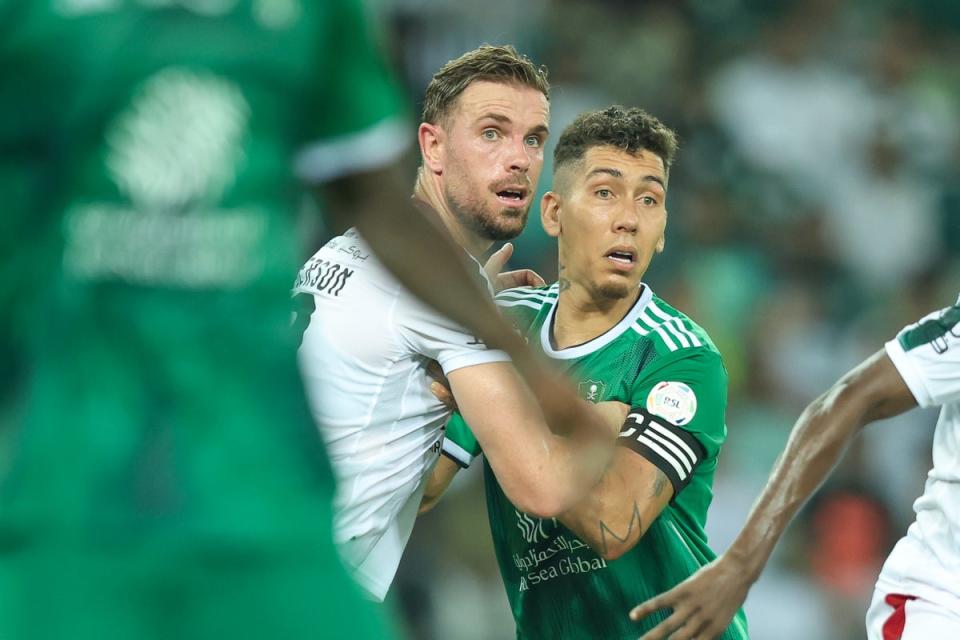 Henderson comes up against former Anfield teammate Roberto Firmino while playing in the SPL (Getty)