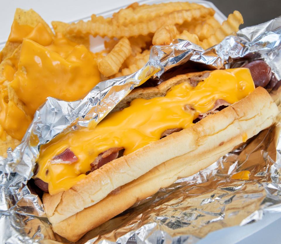 A Bacon Cheddar Dog is ready to eat Monday at T.P. Whatadogs in Pensacola.