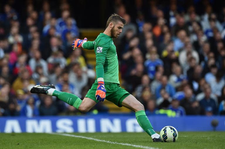 Manchester United's Spanish goalkeeper David de Gea clears the ball during the English Premier League football match between Chelsea and Manchester United at Stamford Bridge in London on April 18, 2015