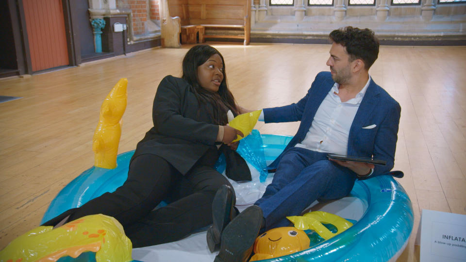 The Apprentice's Steve Darken and Foluso Falade sitting in a paddling pool