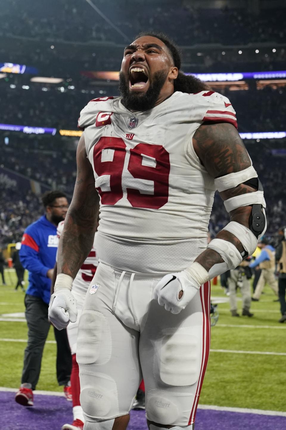 New York Giants' Leonard Williams celebrates after an NFL wild card football game against the Minnesota Vikings Sunday, Jan. 15, 2023, in Minneapolis. The Giants won 31-24. (AP Photo/Abbie Parr)