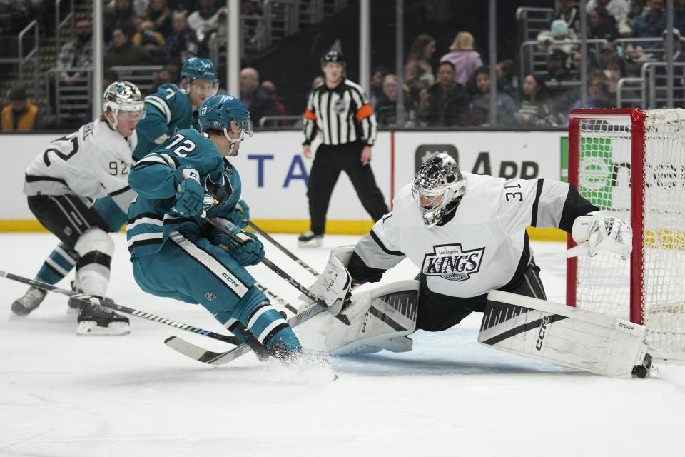 Los Angeles Kings goaltender David Rittich (31) stops a shot by San Jose Sharks left wing William Eklund (72) during the first period of an NHL hockey game Monday, Jan. 22, 2024, in Los Angeles. (AP Photo/Ashley Landis)