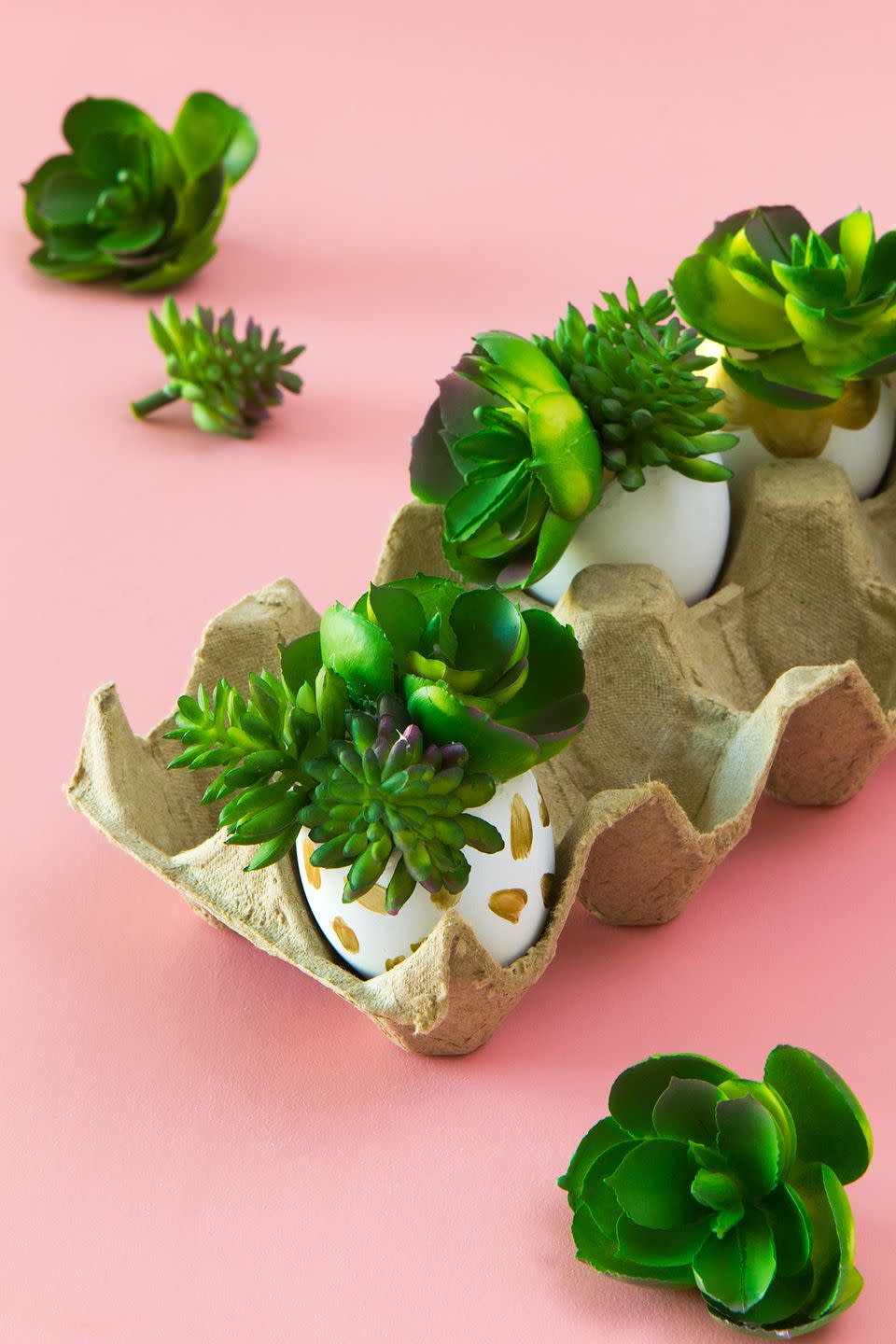 <p>You don't need a green thumb to make these little planters. Succulent eggs are <em>perfect</em> for garden easter egg hunts, because they'll blend right in!</p><p><strong><strong>Get the tutorial at <a href="https://sarahhearts.com/diy-faux-succulent-easter-egg-planters/" rel="nofollow noopener" target="_blank" data-ylk="slk:Sarah Hearts" class="link ">Sarah Hearts</a>.</strong></strong></p>