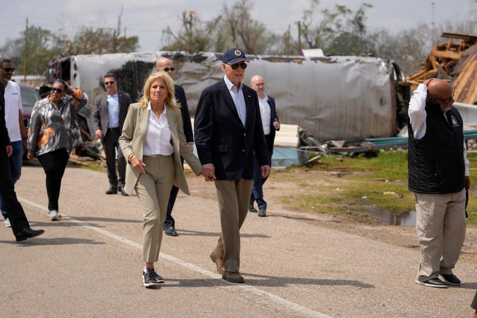 President Joe Biden and first lady Jill Biden survey the damage after a deadly tornado and severe storm moved through the area in Rolling Fork, Miss., Friday, March 31, 2023.
