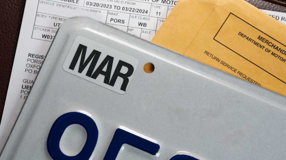 License plate registration for car with documents - Bill Oxford/iStockphoto