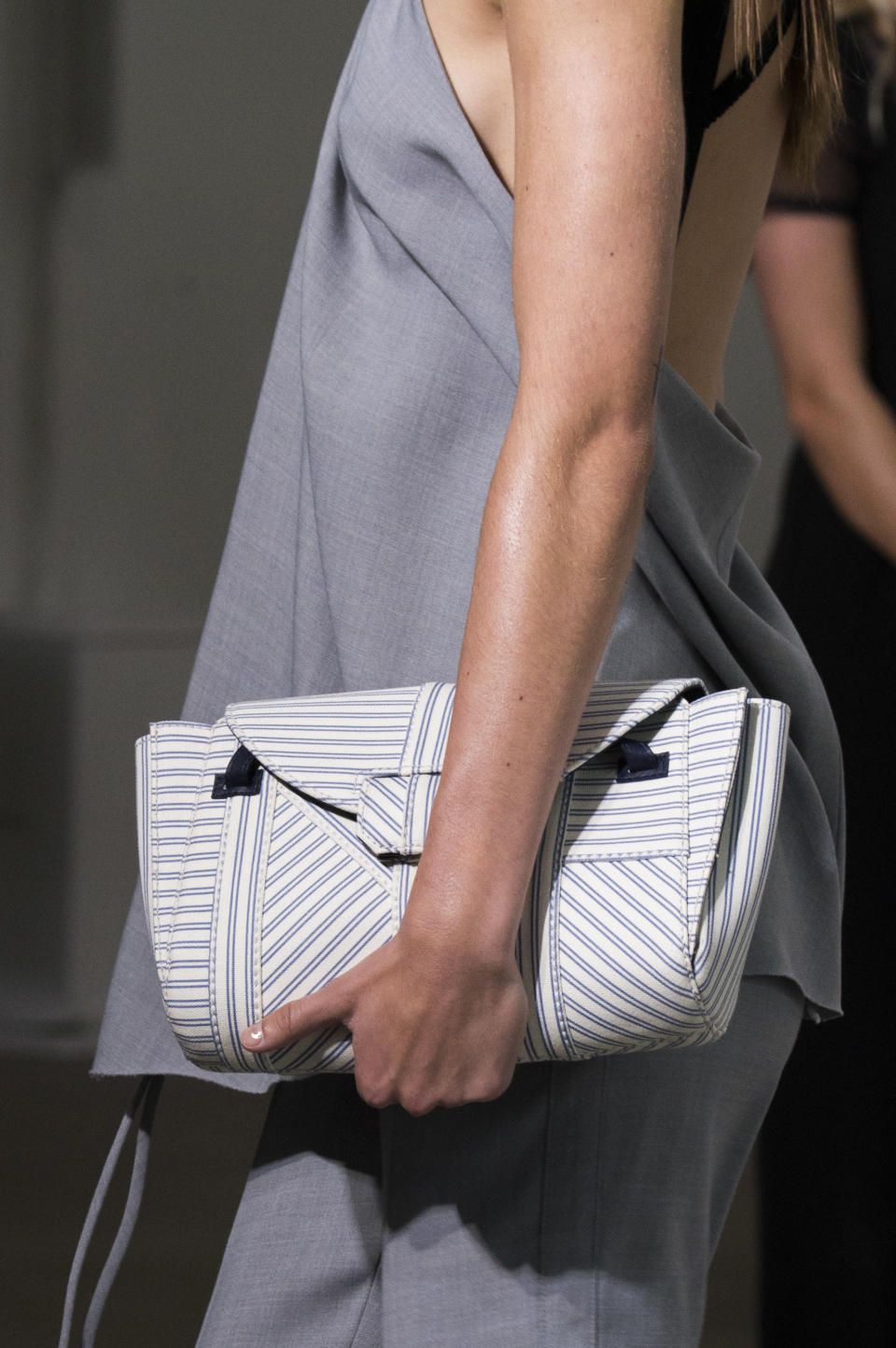 <p><i>Pinstriped clutch from the SS18 Jason Wu collection. (Photo: ImaxTree) </i></p>