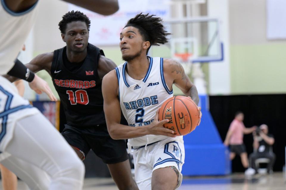 URI's Brayon Freeman drives on Illinois State's Darius Burford on Wednesday. Freeman scored a game-high 21 points in Rhody's win at the Cayman Islands Classic.